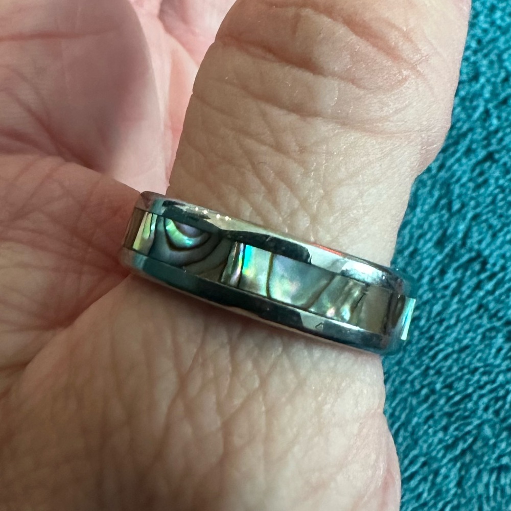 Stainless steel with abalone ring, size 8
